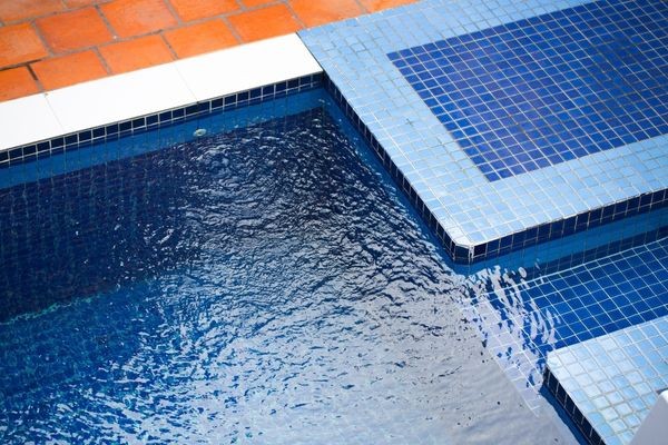 Keeping Your Pool in Top Shape Between Scheduled Pool Services: Tips and Tricks